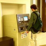 OneCard - TCF Bank - Student at ATM